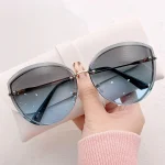 High-Quality-women-s-Oval-Rimless-Sunglasses-Lady-Metal-Cay-Eye-Shades-for-Women-Driving-Glasses